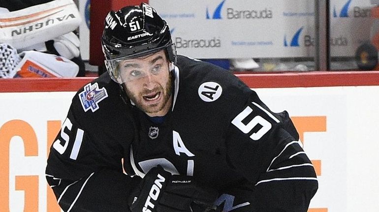 New York Islanders center Frans Nielsen skates with the puck...