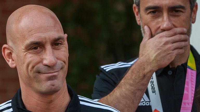 President of Spain's soccer federation, Luis Rubiales, left, stands next...