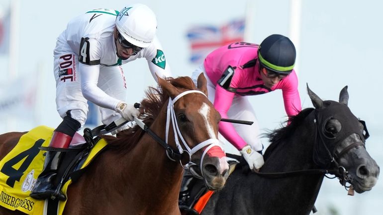 Caitlinhergrtness (4) ridden by Jockey Rafael Hernandez in a close...