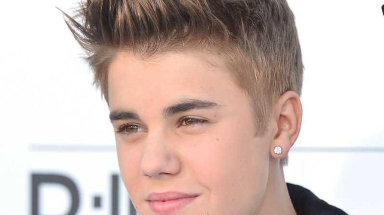 Justin Bieber arrives at the 2012 Billboard Music Awards. (May...