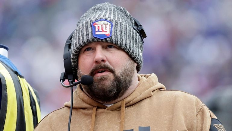 Giants head coach Brian Daboll looks on during the first half...