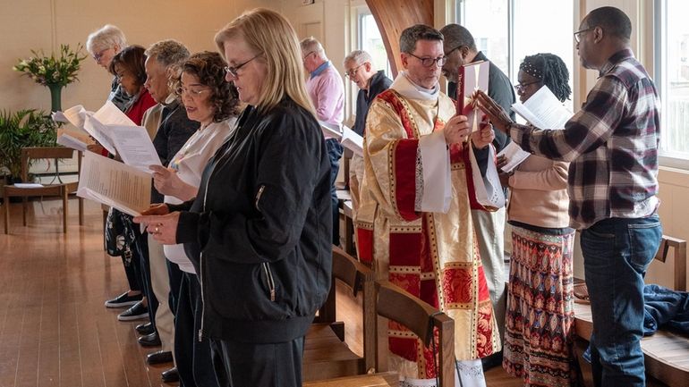 The Rev. Daniel Ade at Saturday's services at Incarnation Chapel...