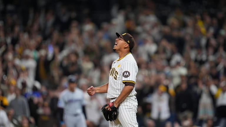 San Diego Padres relief pitcher Jeremiah Estrada celebrates after the...