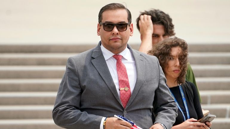 Rep. George Santos departs federal court June 30 in Central Islip.