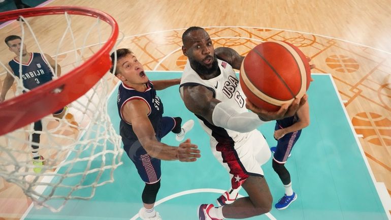 United States' LeBron James (6) shoots during a men's semifinal...