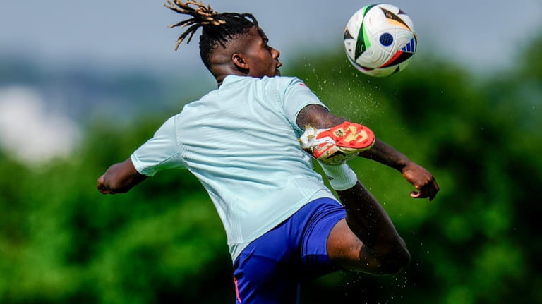Spain's Nico Williams controls the ball during a training session...