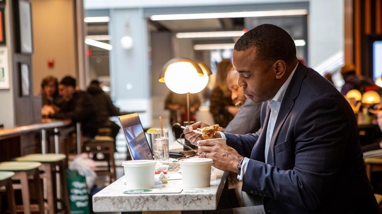 J. Womack has lunch at the Moynihan Food Hall in...