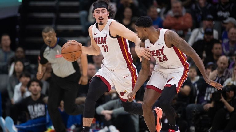 Miami Heat guard Jaime Jaquez Jr. (11) starts a fast...