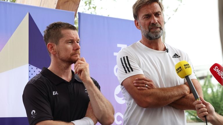 German football manager Jurgen Klopp, right, and para badminton player...