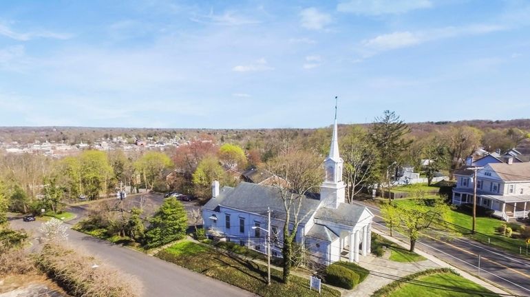 The 5,268-square-foot church contains 10 rooms. Its adjoining lot houses a five-room...