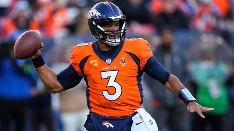 Denver Broncos quarterback Russell Wilson (3) throws during the first...