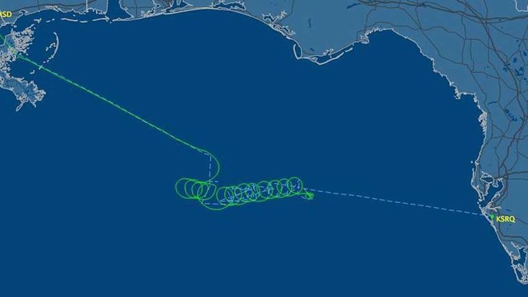 This radar image released by FlightAware.com shows the flight path...