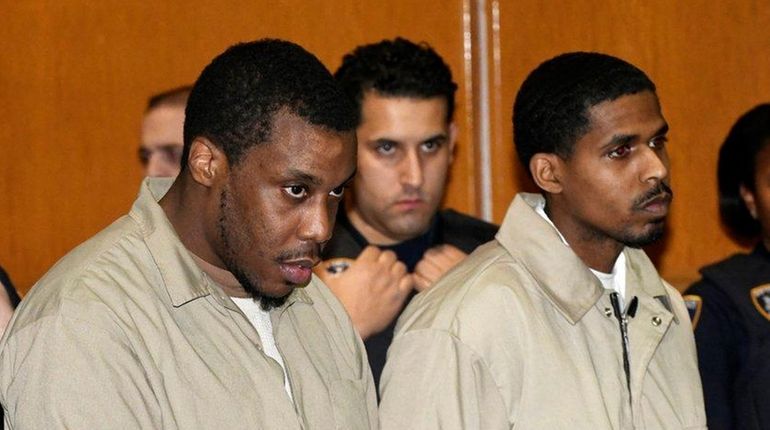 Quincy Homere, second from left, and Jamar Hill are arraigned...