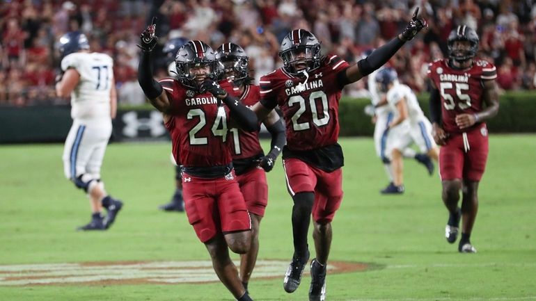 South Carolina defensive back Jalon Kilgore (24) celebrates a game...