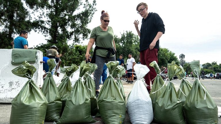 Rebecca Glaser, left, and her son Jaden Fitzpatrick, 16, prepare...