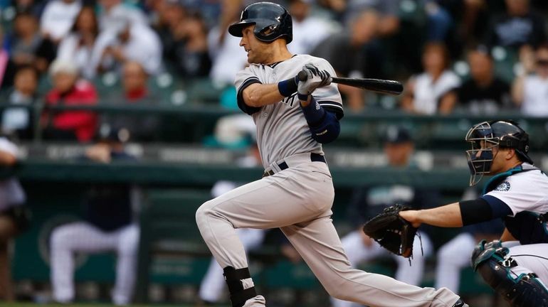 Derek Jeter singles in the first inning against the Seattle...