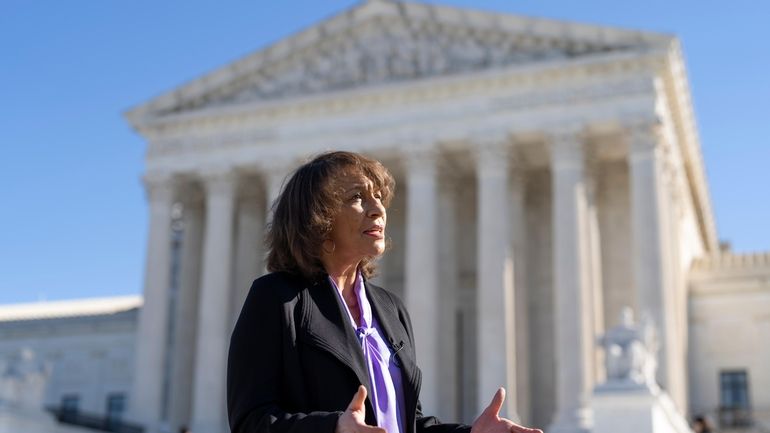 Ruth Glenn, a domestic violence survivor, speaks with The Associated...