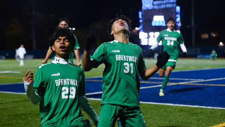 Brentwood's Josue Granados, right, celebrates with Pablo Aparicio after scoring...