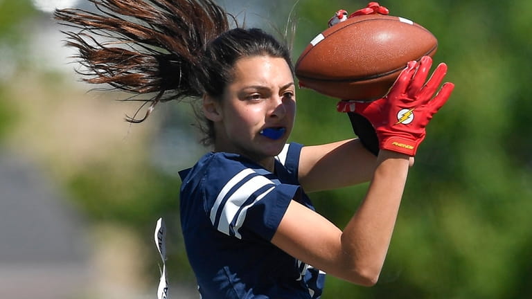Plainview-Old Bethpage JFK's Lara Glasser catches a pass during a...
