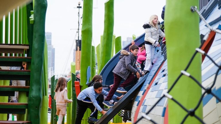   Kids can play on the 4,000-square-foot marine-science-focused playground at...