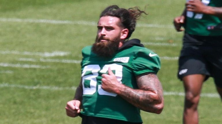 Tyler Conklin runs during Jets OTAs in Florham Park, N.J., on...