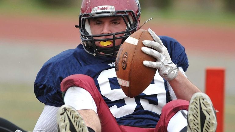 Conferences II-III tight end No. 99 Chris Lent of Glen...