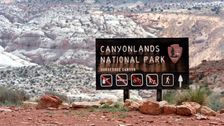 A sign for Canyonlands National Park is seen, May 6,...