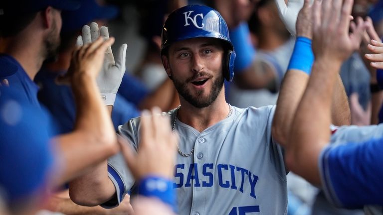 Kansas City Royals' Paul DeJong celebrates his home run in...