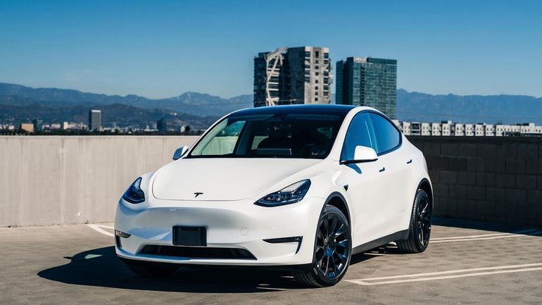 This photo provided by Edmunds shows a Tesla Model Y....