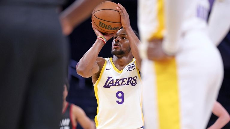 Los Angeles Lakers' Bronny James (9) shoots a free throw...