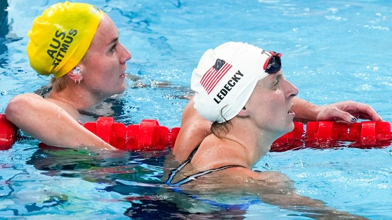 Katie Ledecky, of the United States, right, and Ariarne Titmus,...