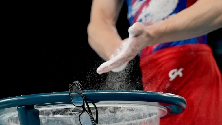 Stephen Nedoroscik, of United States, pares to compete during a...