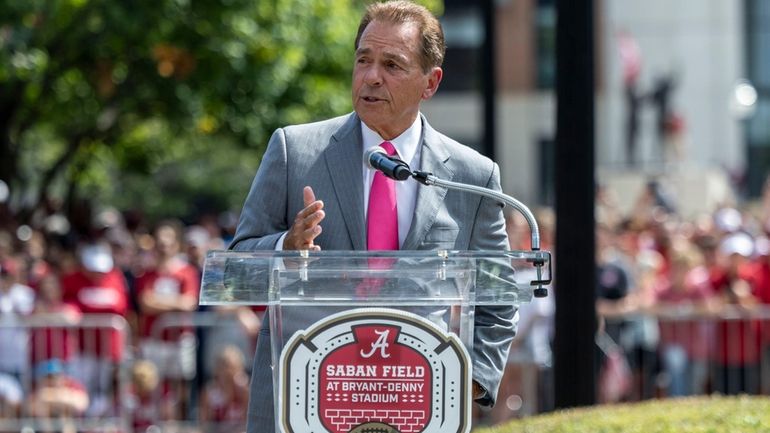 Former Alabama football head coach Nick Saban speaks as the...