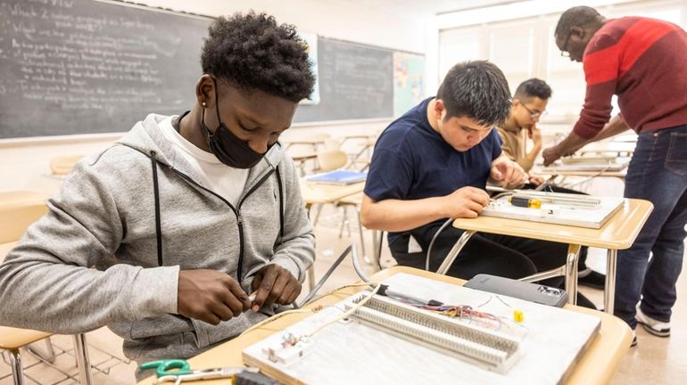 Christian Brown and other students in an Earn & Learn...