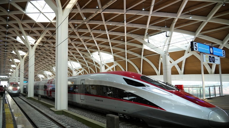 High-speed train is parked during the opening ceremony for launching...
