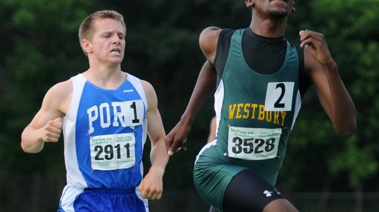 Westbury High School junior Owen Skeete, right, and Port Washington...