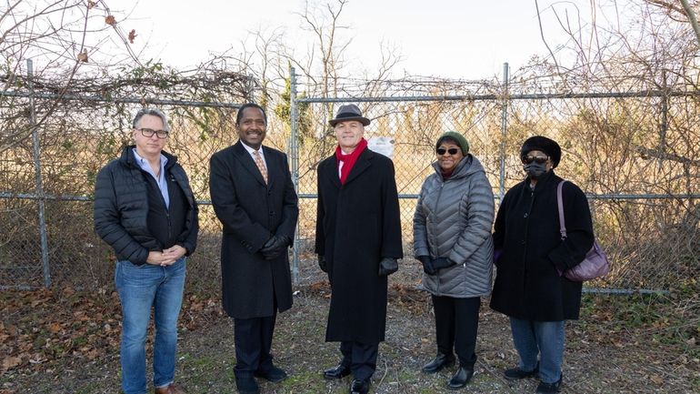 From left, Greg Wagner, Huntington's director of cultural affairs; Barry Lites,...