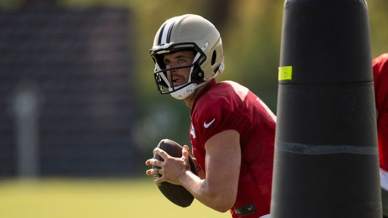 New Orleans Saints quarterback Derek Carr works on a drill...