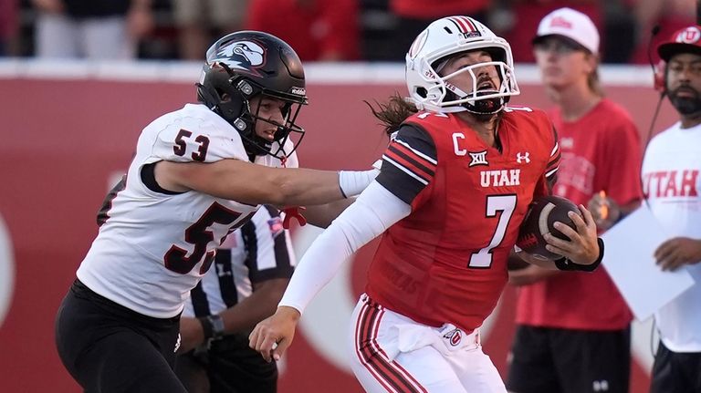 Southern Utah linebacker Mason Stromstad (53) pushes Utah quarterback Cameron...