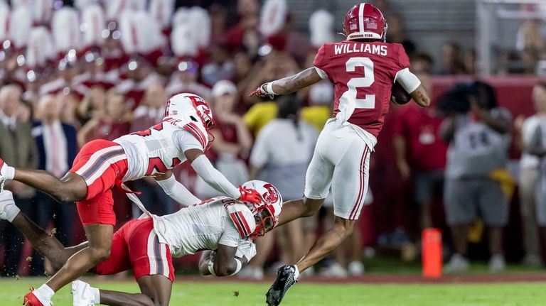 Alabama wide receiver Ryan Williams (2) grabs a pass and...