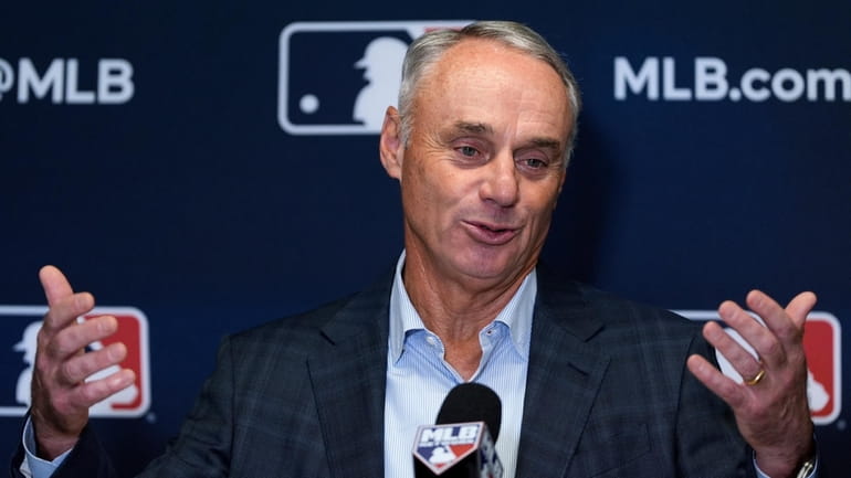 Major League Baseball Commissioner Rob Manfred speaks at a press...