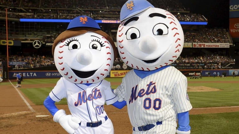 Mrs. Met and Mr Met pose for a photograph.