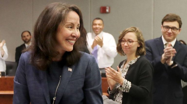 Geraldine Hart is applauded after being approved to become the...