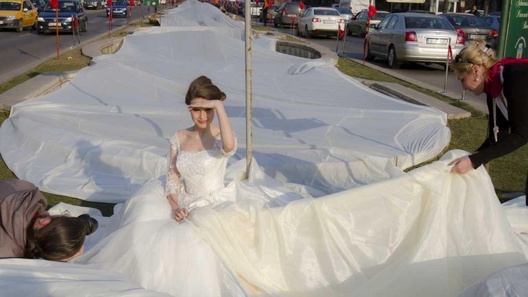 Model Emma Dumitrescu, 17, poses to show the world's longest...