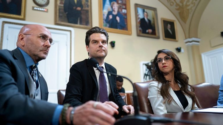 From left, Rep. Clay Higgins, R-La., Rep. Matt Gaetz, R-Fla.,...