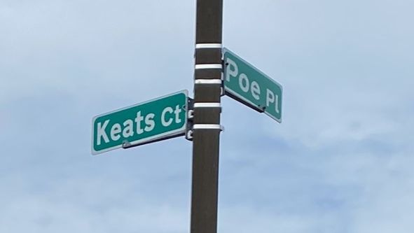 A signpost at the corner of Poe Place and Keats...