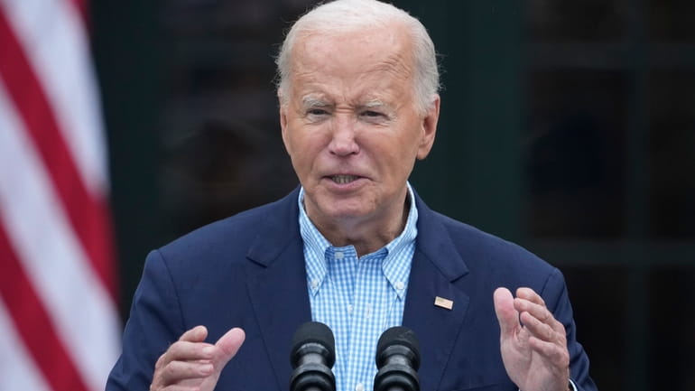 President Joe Biden speaks to active-duty military service members and...