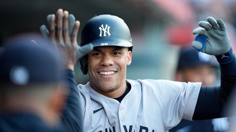 Yankees' Juan Soto celebrates his solo home run during the...