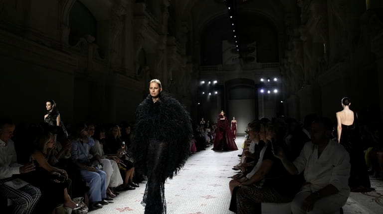 Models wear creations for the Elie Saab Haute Couture Fall-Winter...