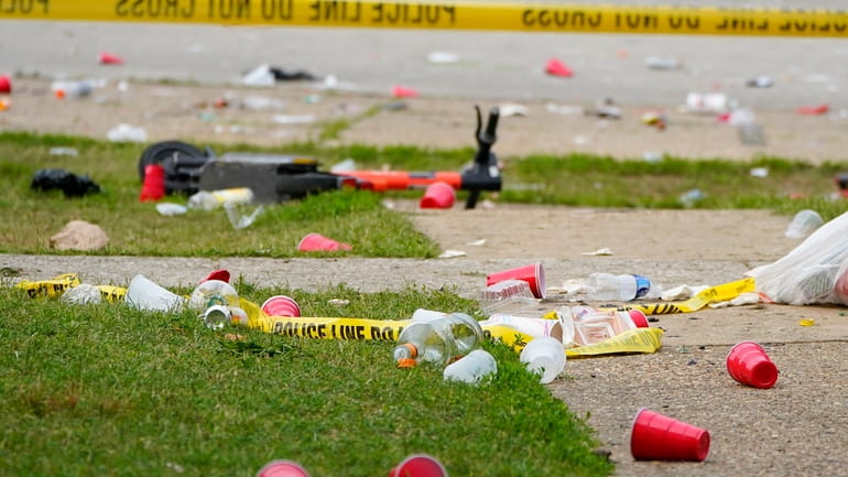 Party debris is seen in the area of a mass...